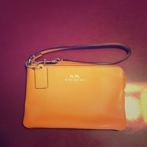 Yellow coach wristlet